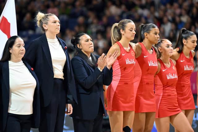 Liana Leota, centre, on England Roses coaching duty (Picture: Kai Schwoerer/Getty Images)