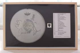 Signed Arctic Monkeys memorabilia is being auctioned to raise money for Meersbrook Bank Primary School in Sheffield