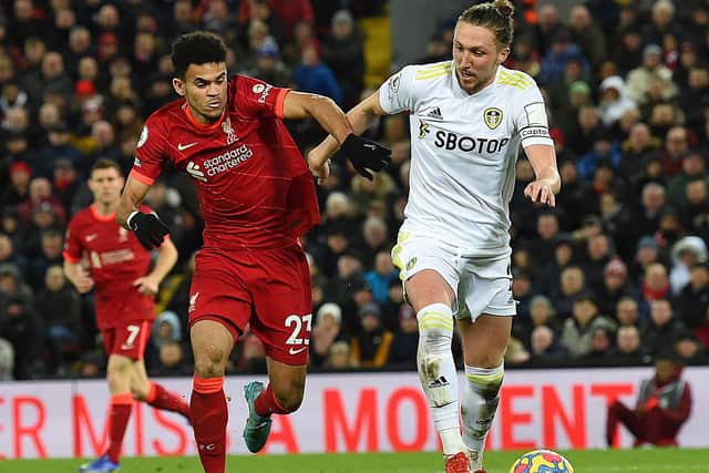 Luis Diaz of Liverpool with Luke Ayling of Leeds United in action during the Premier League match between Liverpool and Leeds United at Anfield on February 23, 2022 in Liverpool, England. (Photo by John Powell/Liverpool FC via Getty Images)