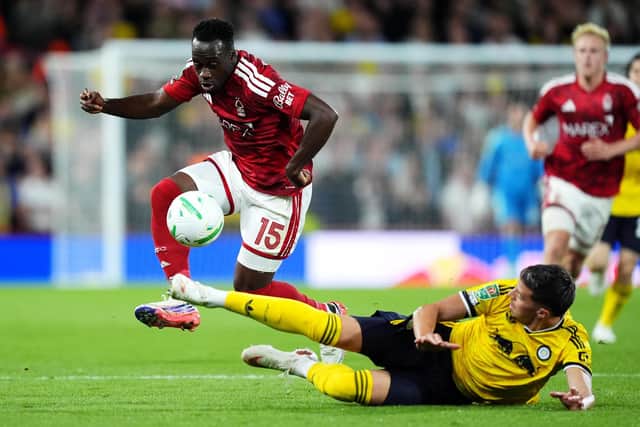 GETTING STUCK IN: Leeds United's Tarik Muharemovic tackles Arnaud Kalimuendo (Image: Press Association)