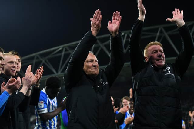 PARTNERSHIP: Huddersfield Town manager Neil Warnock and his assistant Ronnie Jepson are applauded off the field after May's victory over Sheffield United