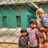 A Rohingya family arrives for a meeting with the Myanmar officials in Teknaf on March 15, 2023. - Myanmar officials were meeting with Rohingya refugees on March 15 in what Bangladeshi authorities said was the revival of a long-stalled effort to return the persecuted minority to their homeland. (Photo by AFP)