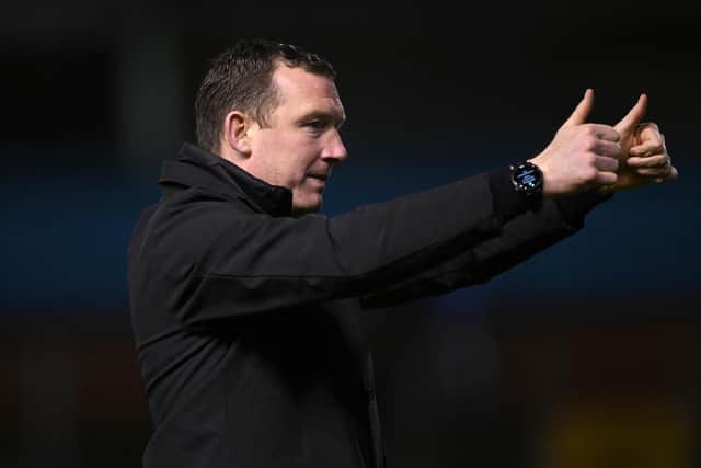 GOOD JOB: Barnsley manager Neill Collins celebrates victory against Carlisle United at Brunton Park on Tuesday night. Picture: Stu Forster/Getty Images.