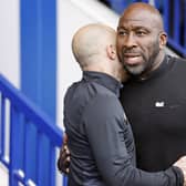 Derby County manager Paul Warne greets Sheffield Wednesday manager Darren Moore ahead of the Sky Bet League One match at Hillsborough Stadium, Sheffield. Picture date: Sunday May 7, 2023. PA Photo. See PA Story SOCCER Sheff Wed. Photo credit should read: Richard Sellers/PA Wire.

RESTRICTIONS: EDITORIAL USE ONLY No use with unauthorised audio, video, data, fixture lists, club/league logos or "live" services. Online in-match use limited to 120 images, no video emulation. No use in betting, games or single club/league/player publications.