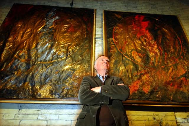 Sir Ernest Hall pictured with artwork in the Viaduct Theatre, Dean Clough Mills, in 2005.