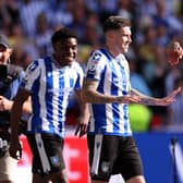 HEADS UP: Sheffield Wednesday's Josh Windass celebrates with team-mates after scoring the winning goal in the dying seconds of extra time at Wembley Stadium to beat Barnsley 1-0. Picture: Richard Heathcote/Getty Images