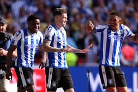 HEADS UP: Sheffield Wednesday's Josh Windass celebrates with team-mates after scoring the winning goal in the dying seconds of extra time at Wembley Stadium to beat Barnsley 1-0. Picture: Richard Heathcote/Getty Images