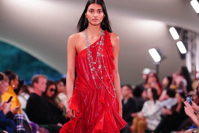 SUMMER RED: Red featured at the Burberry show at London Fashion Week for SS24. Picture: Ian West/PA Wire