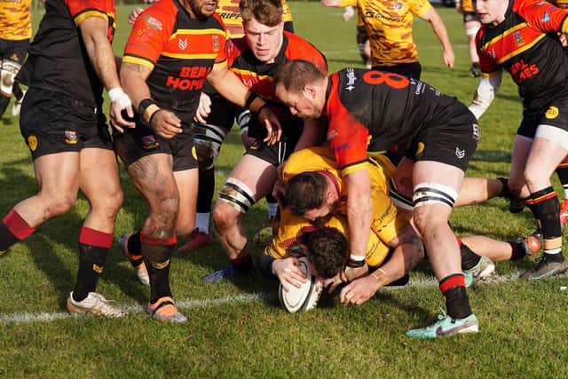 Bottom of the pile: Barney Goatley opens the scoring for Sheffield Tigers against Hull (Picture: Mike Inkley)