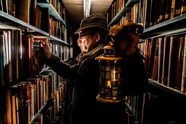 Sheffield Central Library, are opening up their basement for tours called 'Secrets of the Stack' the archive houses several thousand books and periodicals deep beneath the library and the stack is an area not usually open to the public. Pictured  Historian, Paul Casson, AKA Sheridan Shacklethwaite, tour guide. Picture By Yorkshire Post Photographer,  James Hardisty. Date: 6th March 2023.