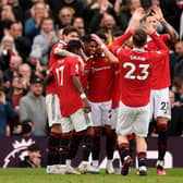 Manchester United's English striker Marcus Rashford (3L) celebrates scoring the team's second goal during the English Premier League football match between Manchester United and Leicester City at Old Trafford in Manchester, north west England, on February 19, 2023. (Photo by OLI SCARFF/AFP via Getty Images)