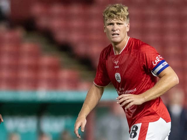 Barnsley captain Cameron McGeehan, pictured in action in the recent League One game against Blackpool. Photo: Tony Johnson.