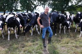 NFU deputy president and East Yorkshire farmer Paul Tompkins with his dairy herd.