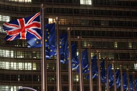 A picture taken on December 9, 2020 shows British and European flags fluttering outside the Berlaymont building, the European commission headquarters. PIC: FRANCOIS WALSCHAERTS/AFP via Getty Images