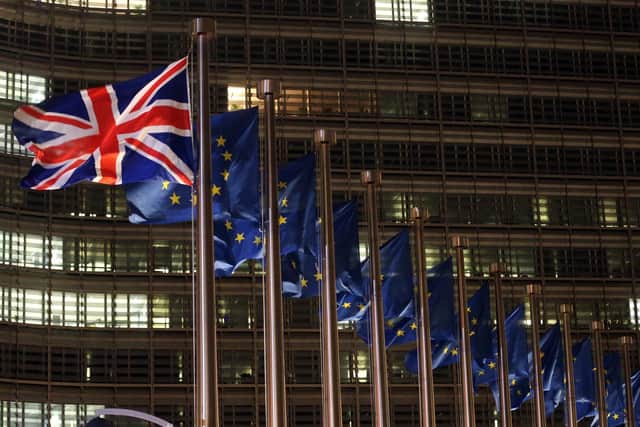 A picture taken on December 9, 2020 shows British and European flags fluttering outside the Berlaymont building, the European commission headquarters. PIC: FRANCOIS WALSCHAERTS/AFP via Getty Images