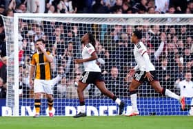 DECISIVE MOMENT: Fulham's Alex Iwobi (centre) celebrates scoring what proved to be the winning goal against Hull City. Picture: Bradley Collyer/PA.