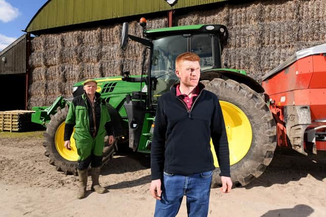 Jonathan Waring with his son Tom pictured at Park Farm Everingham. Picture taken by Yorkshire Post Photographer Simon Hulme