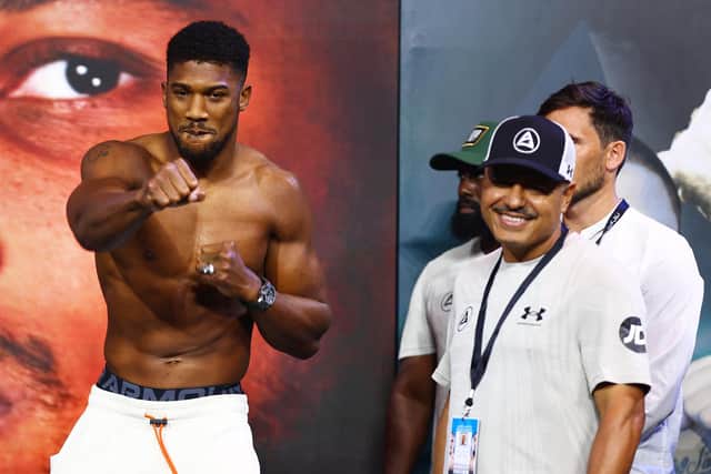 JEDDAH, SAUDI ARABIA - AUGUST 19: Anthony Joshua and their coach Robert Garcia react after the Weigh-In for Oleksandr Usyk v Anthony Joshua Rage on the Red Sea event at King Abdullah Sports City Arena on August 19, 2022 in Jeddah, Saudi Arabia. (Photo by Francois Nel/Getty Images)