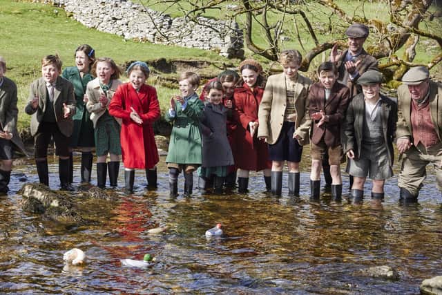 The duck race: A scene from the opening episode of series four will see Helen splashing about with the local children. Picture: Channel 5/Playground