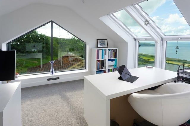 A top floor bedroom/work space Velux roof windows providing magnificent views of the bay.
