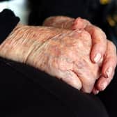 Hands of an elderly woman at a care home. PIC: Peter Byrne/PA Wire
