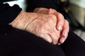 Hands of an elderly woman at a care home. PIC: Peter Byrne/PA Wire