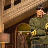 Claudia wears green cable jumper with smiley face elbows, £480 from Japanese menswear brand Kapital; kilt style skirt, £259, from Brora, which has a shop in Harrogate; and Dr Martens hi-top Chelsea boots, £180. From The Traitors II, Credit: BBC/Studio Lambert/LLARA PLAZA