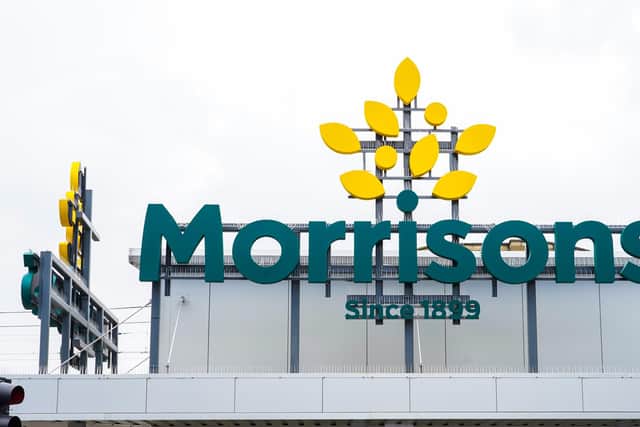 A view of a store sign at a branch of Morrisons supermarket in Camden, London.