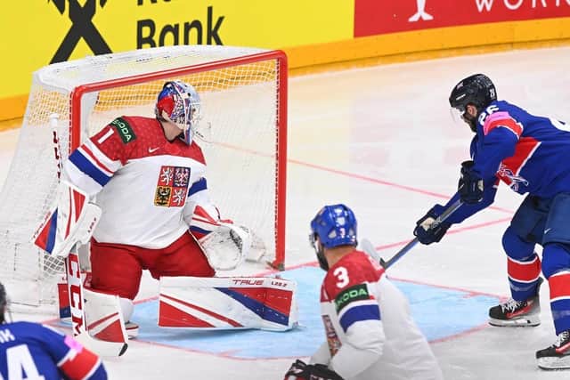 HOPE: Evan Mosey (far right) steers home a pass from GB team-mate Liam Kirk to make it 3-1 at Prague Arena on Saturday, hosts Czechia eventually winning 4-1. Picture: Dean Woolley