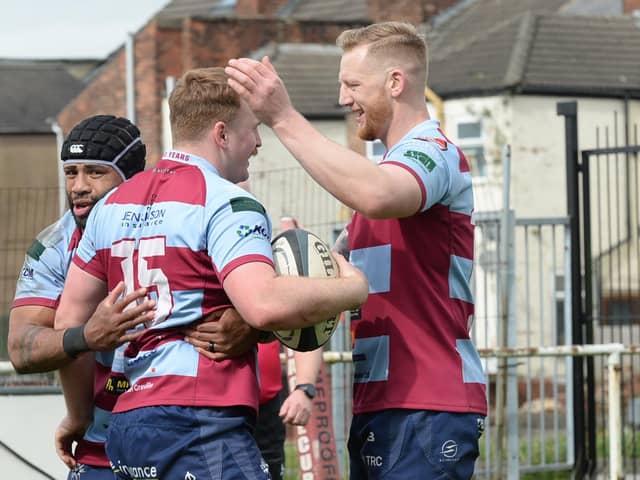 One last job: Rotherham Titans players celebrate a try in one of the 24 wins they have earned that have taken them to the brink of the title.