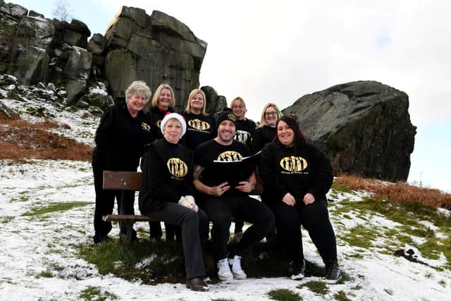 Pictured promoting their Christmas album members of the Voices of Yorkshire Choir at the Cow and Calf rocks at Ilkley. Picture Gerard Binks