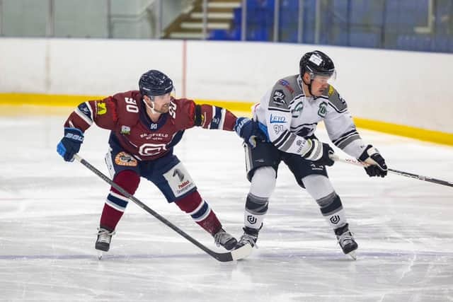 WE'LL MEET AGAIN: Jonathan Kirk battles with former Sheffield Steeldogs' team-mate Nathan Salem during the pre-season challenge game at Ice Sheffield. Picture courtesy of Peter Best/Steeldogs Media