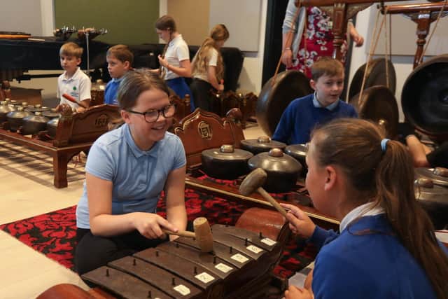 Children from Ainderby Steeple CofE Primary School, Morton-on-Swale, playing the Javanese Gamelan at York St John University. Image: Duncan Lomax, Ravage Productions.