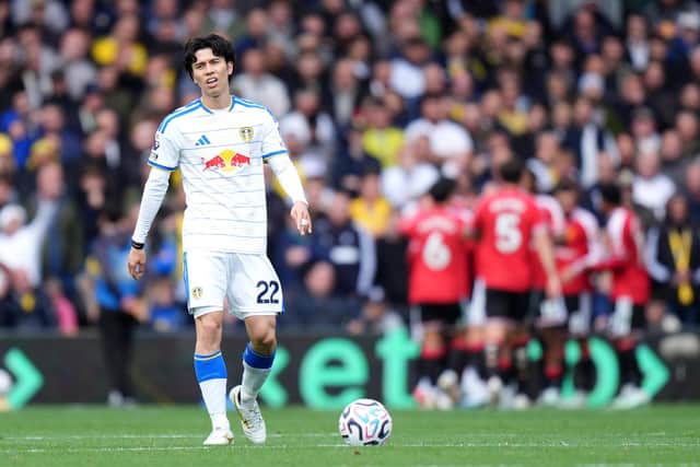 HAMMER BLOW: Leeds United's Ao Tanaka shows his disappointment as Manchester United players celebrate (Image: Annabel Lee-Ellis)