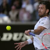 Hitting back: Cameron Norrie of Britain plays a forehand return to Alexander Zverev of Germany during their fourth round match at the Australian Open. (AP Photo/Alessandra Tarantino)