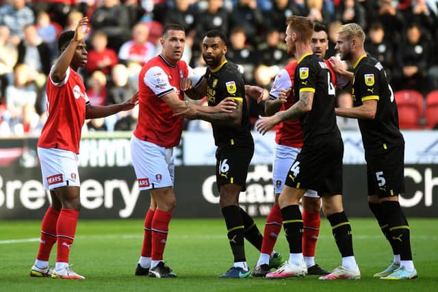 EXPERIENCE: Despite losing to Wigan Athletic, Richard Wood (second from the left), enjoyed the challenges of being Rotherham United's caretaker manager