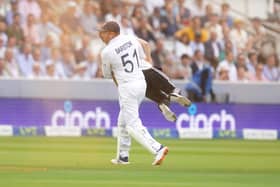 England's Johnny Bairstow carrying a Just Stop Oil protestor off the pitch  during day one of the second Ashes test match at Lord's, London. Picture: Adam Davy/PA Wire.