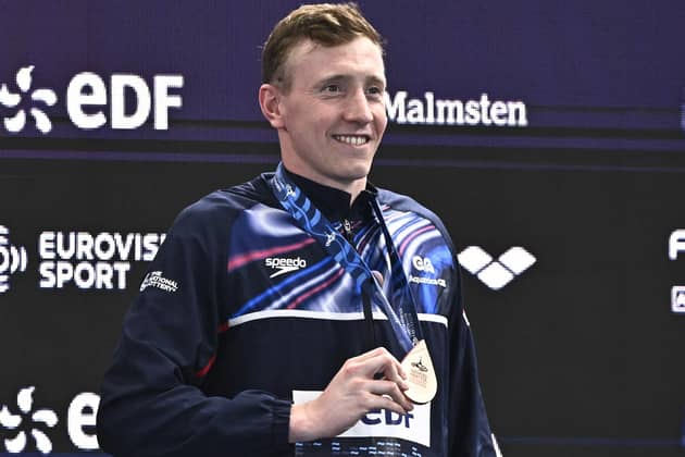 Britain's Max Litchfield poses with his bronze medal on the podium of the men's 400m individual medley swimming event during the LEN European Aquatics Championships at the Olympic Aquatic Centre in Saint-Denis (Picture: JULIEN DE ROSA / AFP via Getty Images)
