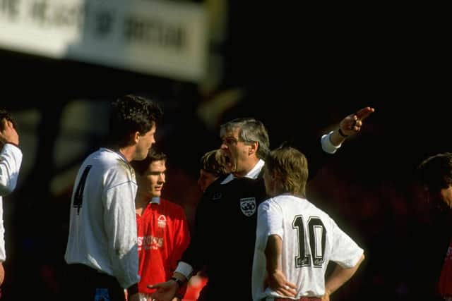 1991:  Tony Gale #4 of West Ham is sent off after being shown the red card by referee Keith Hackett during the FA Cup Semi-Final against Nottingham Forest at Villa Park in Birmingham, England. Nottingham Forest won the match 4-0.  \ Mandatory Credit: Shaun  Botterill/Allsport