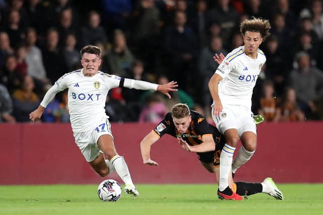 TAKING A TUMBLE: Hull City's Liam Delap (centre) collides with Leeds United's Ethan Ampadu (right)