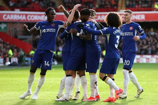 JOY: Chelsea players celebrate Thiago Silva's opening goal