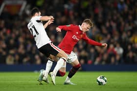 MANCHESTER, ENGLAND - JANUARY 10: Scott McTominay of Manchester United battles for possession with Scott Fraser of Charlton Athletic during the Carabao Cup Quarter Final match between Manchester United and Charlton Athletic at Old Trafford on January 10, 2023 in Manchester, England. (Photo by Gareth Copley/Getty Images)