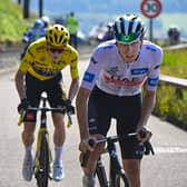 UAE Team Emirates' Slovenian rider Tadej Pogacar (R) wearing the best young rider's white jersey cycles ahead of Jumbo-Visma's Danish rider Jonas Vingegaard (L) wearing the overall leader's yellow jersey in the ascent of the Puy de Dome in the final kilometers of the 9th stage of the 110th edition of the Tour de France (Picture: BERNARD PAPON/POOL/AFP via Getty Images)