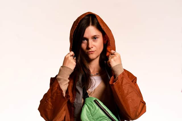 Jo Wanner wears designs she has made from abandoned Leeds Festival tents including skirt, £459, foldaway raincoat, £60, and bumbag, £49. Picture taken by Yorkshire Post Photographer Simon Hulme