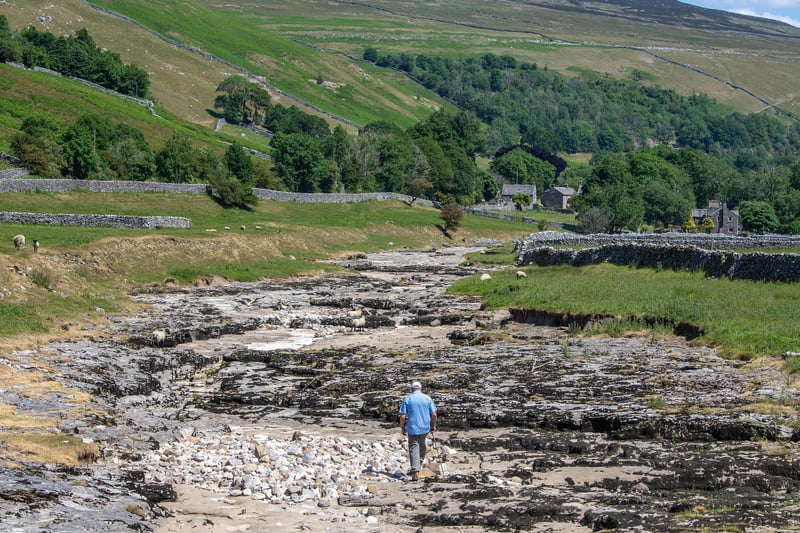 The river dries up every summer during a hot spell as the water flows underground north of Litton, into huge caverns under the riverbed and re-emerges near Arncliffe downstream.