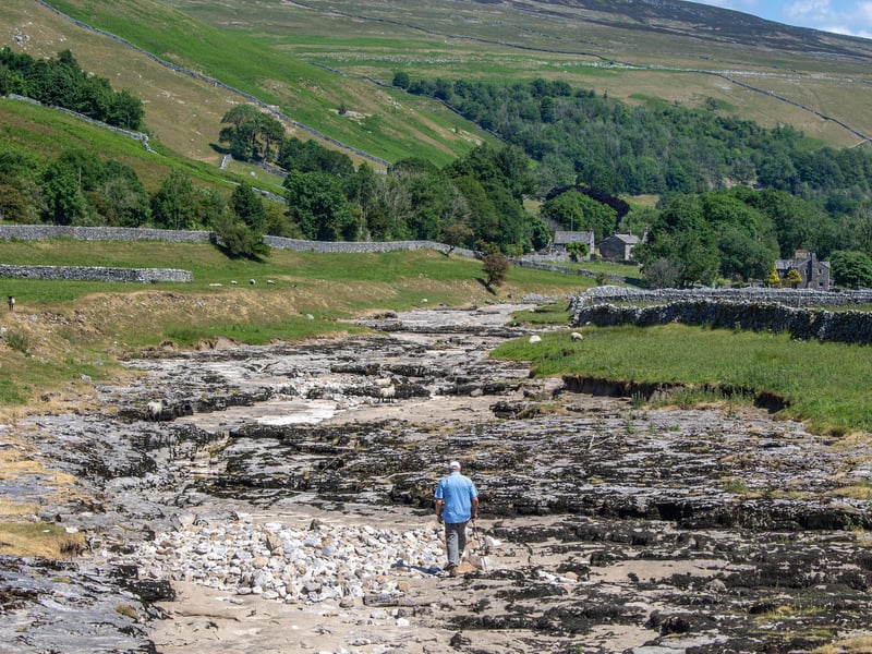 The river dries up every summer during a hot spell as the water flows underground north of Litton, into huge caverns under the riverbed and re-emerges near Arncliffe downstream.