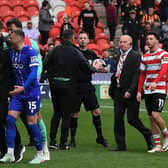 RED MIST: Bradford City's Aden Baldwin (No 15) is sent off by referee Ross Joyce in the crunch promotion game at Doncaster Rovers (Image: Jonathan Gawthorpe)
