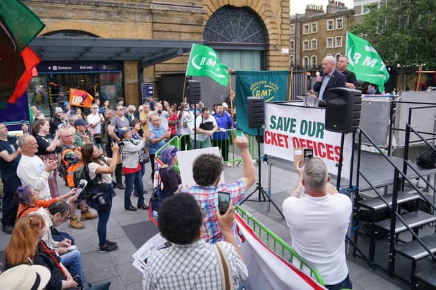 Rail, Maritime and Transport (RMT) union general secretary Mick Lynch speaking at a rally outside King's Cross station. PIC: Jonathan Brady/PA Wire