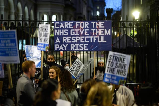 NHS workers and supporters gather outside Downing Street to protest last year. PIC: Leon Neal/Getty Images