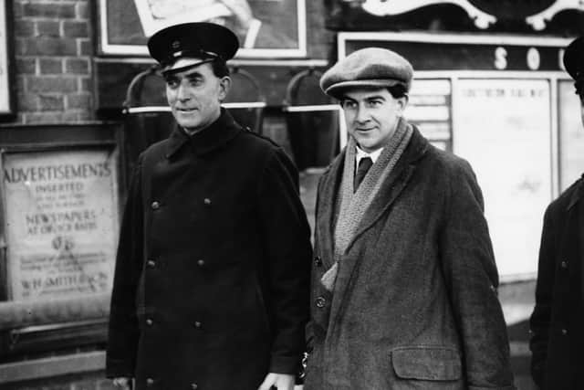 Norman Thorne with a warder at Crowborough Station in Sussex, in January 1925. Photo by E. Bacon/Topical Press Agency/Getty Images.